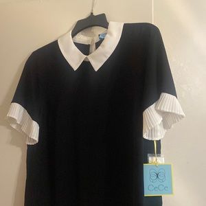 Black and white dress shirt. CeCe brand. Never warn.